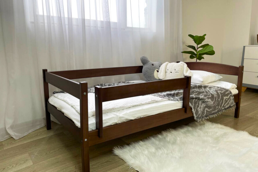 Дитяче ліжко з бортиком Мартель (бук) Тонований